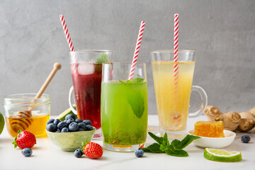Summer fruit and berry drinks with ice lemonade soda