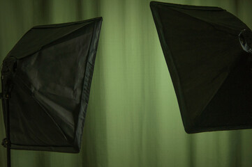 empty studio background and flash light on light green