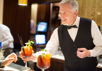Bartender preparing cocktails