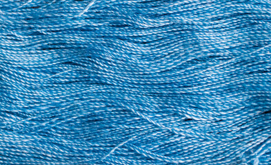 Embroidery threads close-up of blue color