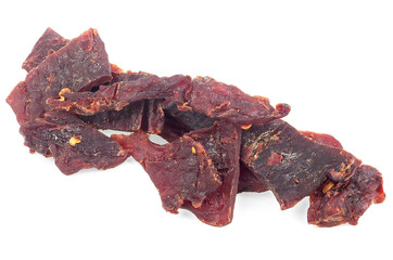 Beef jerky pieces isolated on a white background. Portion of dried jerky beef meat.