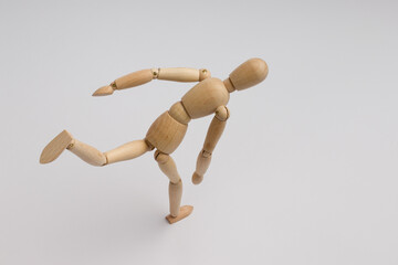 wooden mannequin man running on white background
