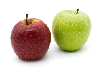 Two apples - red and green apple on white background with water drops