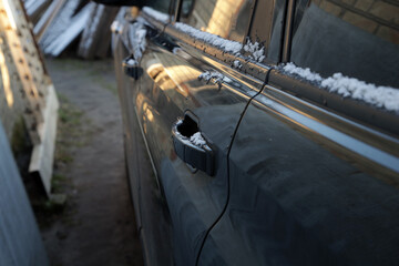 Fototapeta na wymiar snow on the car body