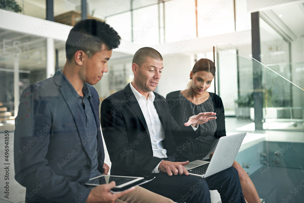 Canvas Prints Tell me what you think. Cropped shot of three colleagues working in the office.