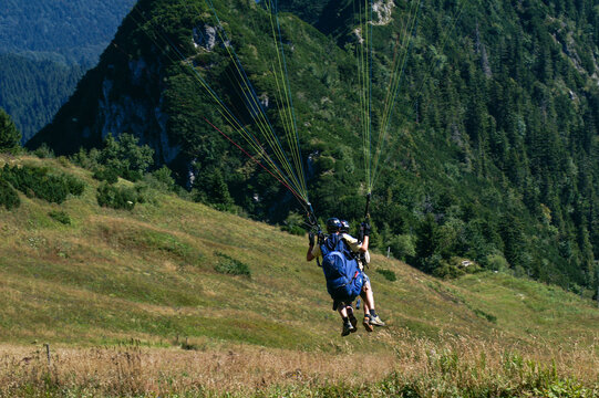 Paraglider tandem shortly after takeoff
