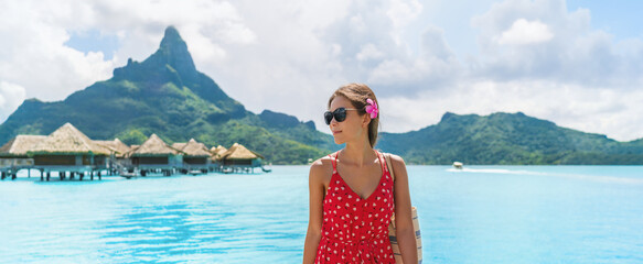 Bora Bora Travel vacation holidays. Woman in French Polynesia on paradise Motu on Bora Bora with...