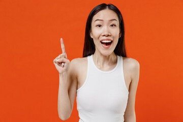 Overjoyed insighted smart happy proactive young woman of Asian ethnicity 20s year old in white tank...