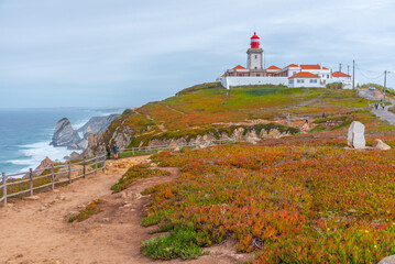 Cabo da Roca lighthouse in Portugal - obrazy, fototapety, plakaty