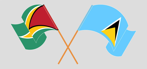 Crossed flags of Guyana and Saint Lucia. Official colors. Correct proportion