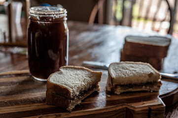selective focus on butter knife edge used to spread a sunflower butter 