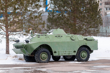 Military wheeled Russian equipment in winter in the city