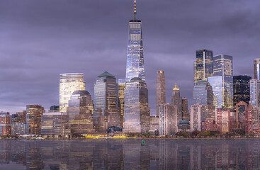 Fototapeta na wymiar Long Exposure night Manhattan skyline with reflection on the Hudson