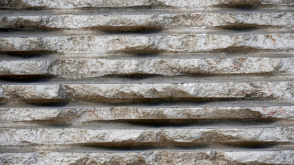 Isolated background of a wall of patterned stone