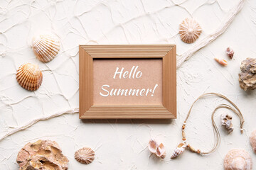 Text Hello Summer in golden frame. Off white background with starfish, shells, seashells, necklace....