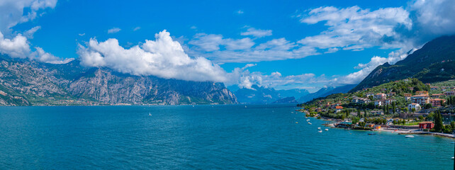 Lakeside view of Malcesine situated at Lago di Garda in Italy - obrazy, fototapety, plakaty