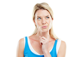 I wonder why I should give you all this copyspace. Studio shot of a young woman looking unsure against a white background.