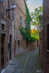 Narrow street in the old town of Urbino in Italy