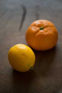 small orange clementine and lemon side by side comparison