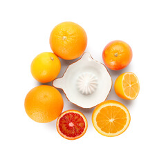 Ceramic juicer and citrus fruits on white background
