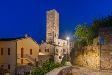Night view of Torre degli Ercolani in Ascoli Piceno, Italy