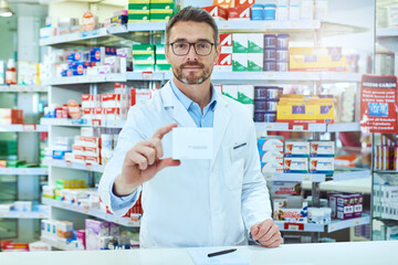 Ive got just what you need. Cropped portrait of a handsome mature male pharmacist working in a...