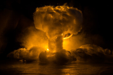 Nuclear war concept. Explosion of nuclear bomb. Creative artwork decoration in dark.