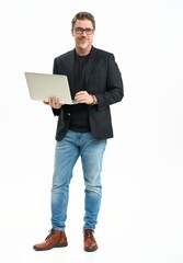 Middle age businessman in business casual using laptop computer. Entrepreneur in jeans and jacket. Mid adult, mature age man, happy smiling. Full length portrait isolated on white. - obrazy, fototapety, plakaty