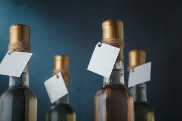 Set of 250 ml bottles of white and pink wine with blank labels. Wines assortment. Close up shot
