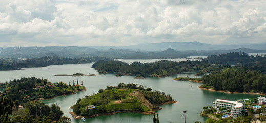 
lake in guatape colombia with small islands