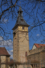 upper gate tower in Marbach, Germany seen through branches