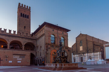 View of the basilica of San Domenico and fountain of Neptune in Bologna. Italy