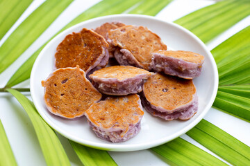 Coconut pancake on white background.