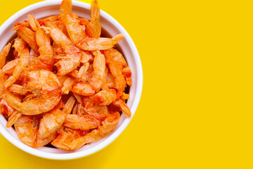 Dried shrimp on yellow background.