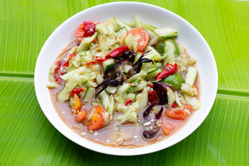 Spicy cucumber salad in plate