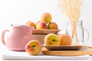 Fresh peach fruit on white background