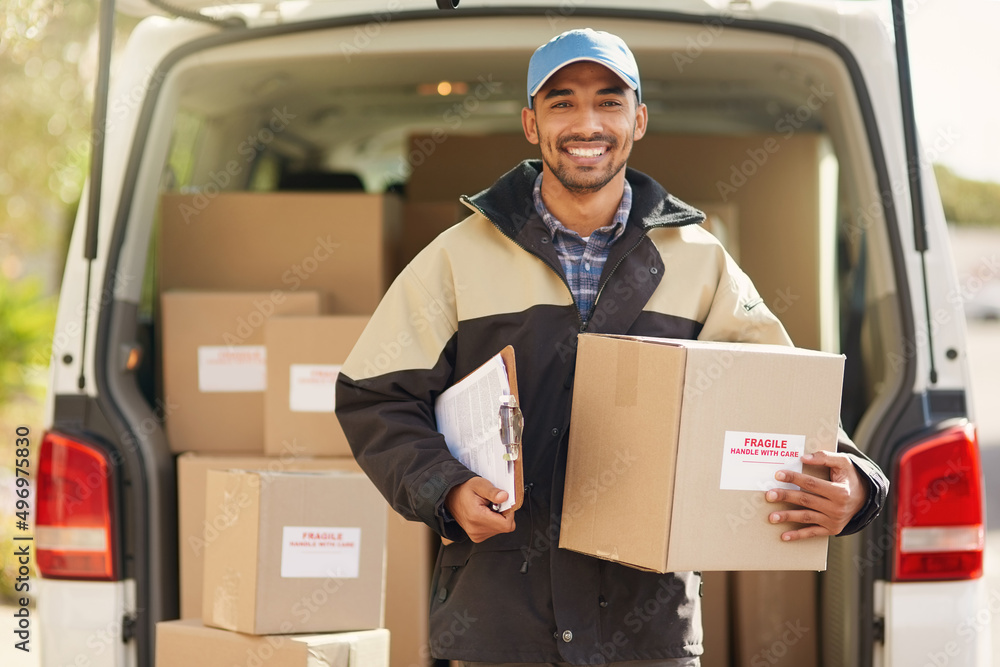 Poster i always get deliveries out on time. portrait of a smiling delivery man standing in front of his van