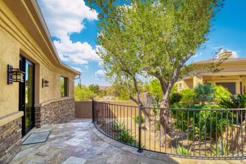 house with a stone pathway outside