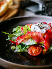 plate of salad on the dining table