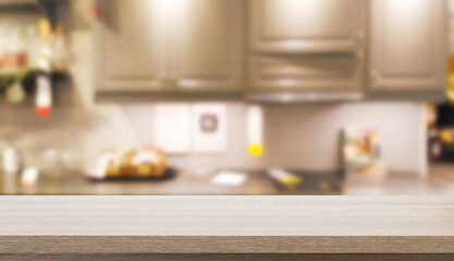 Empty wooden table and blurred kitchen background for display or montage your products