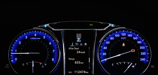 Close up of car dashboard modern Instrument automobile panel with Odometer, speedometer,...