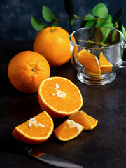 fresh oranges on the table and in a basket
