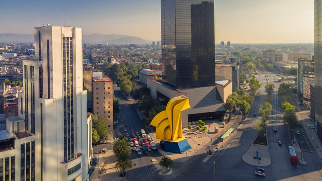 Caballito Tower in the town of Mexico City, reforma street and some buildings 