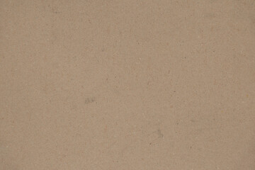 Fototapeta na wymiar Light beige crumpled paper as background, beige