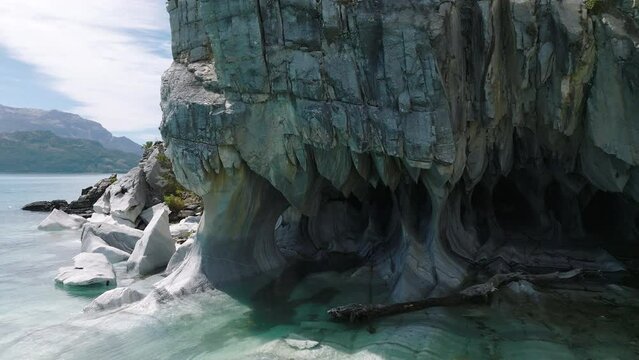 View Of Marble Caves On General Carrera Lake, Puerto Rio Tranquilo. Aerial Dolly Back, Establishing Shot