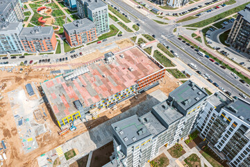 aerial view of construction site of multilevel carpark in residential area