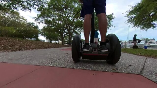 segway going down the sidewalk