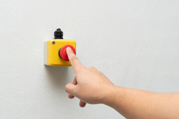 Stop Red Button and the Hand of Worker About to Press it. emergency stop button. Big Red emergency...