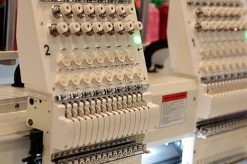 closeup of automatic industrial embroidery machine