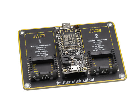 Adafruit Feather Huzzah ESP8266 Wi-Fi, a popular IoT development board among students and hobbyists, with MikroElektronika feather shield expansion board